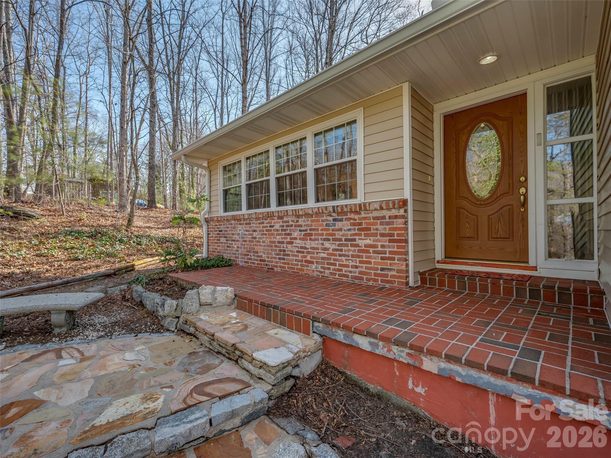 3 Country Road Hendersonville, NC 28791 - Photo 7 of 48 a front view of a house with garden