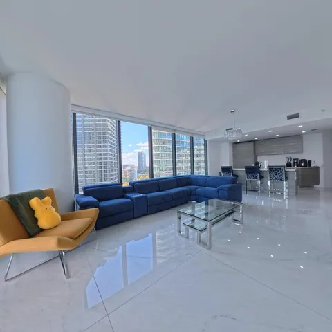 a view of a hallway with washer and dryer