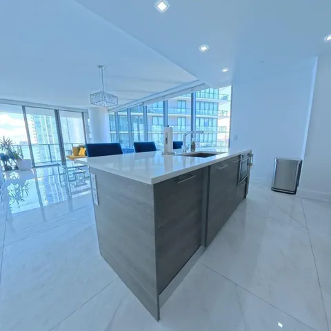 a view of a hallway with washer and dryer