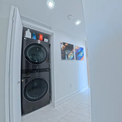 a living room with furniture and a gate