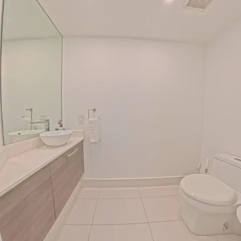 a spacious bathroom with a bathtub and a shower