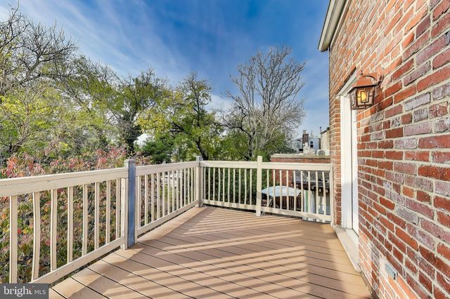 a view of a wooden roof deck