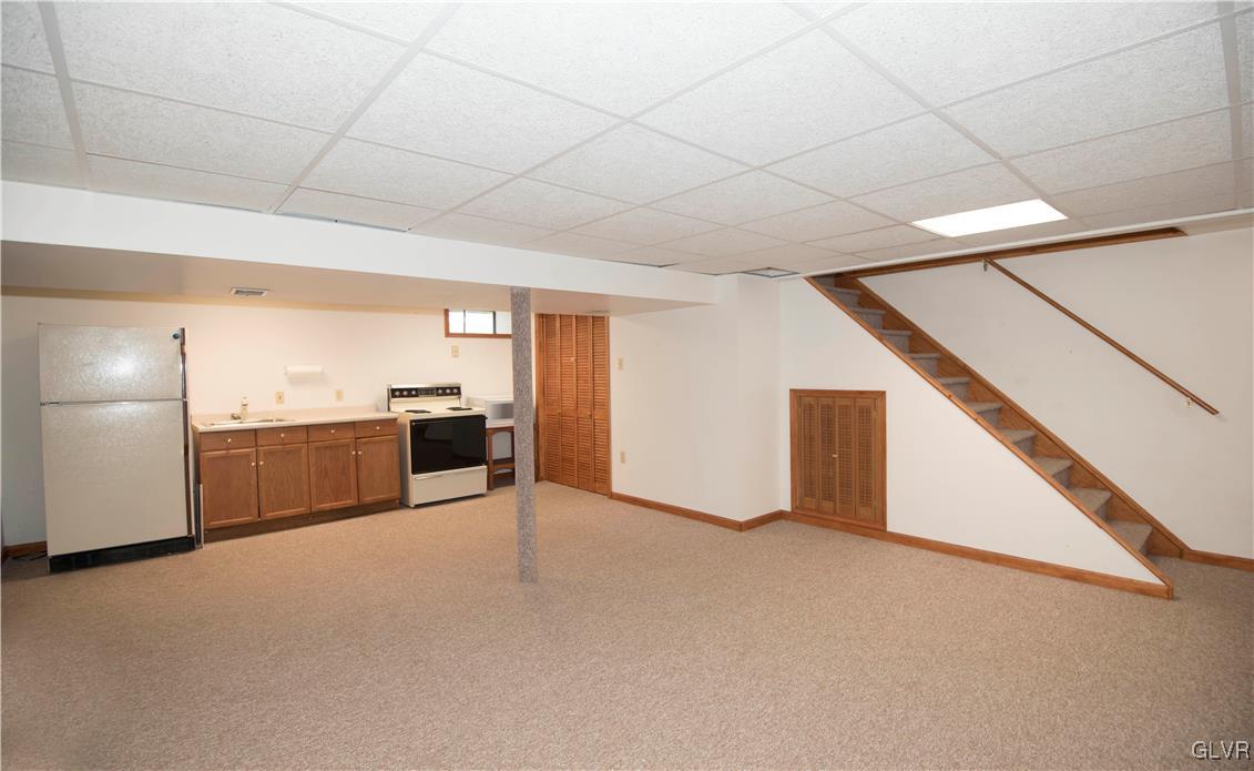 4608 Fairway Road Bethlehem, PA 18020 - Photo 28 of 44 Spacious Rec Room w/small kitchen and storage in L