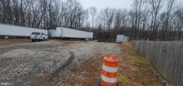 a view of a back yard of the house
