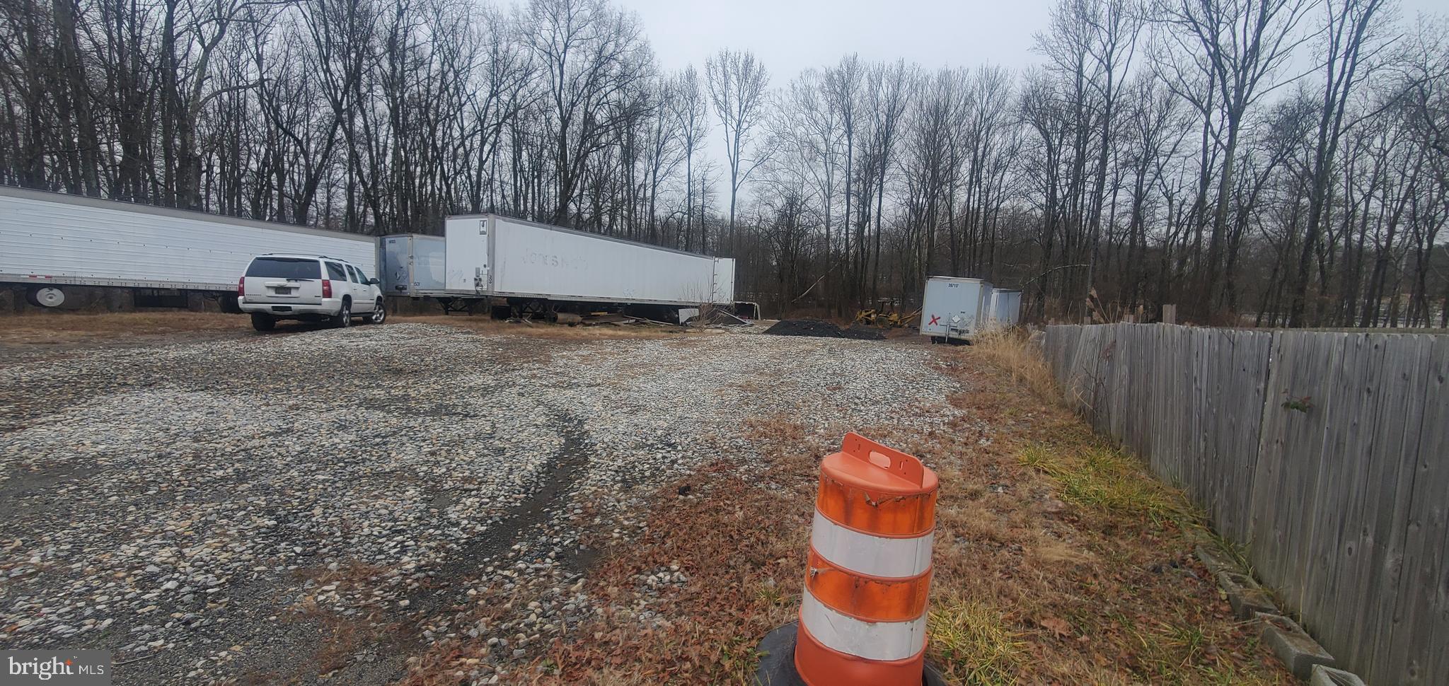 Nottingham Road Elkton, MD 21921 - Photo 4 of 5 a backyard of a house with table and chairs