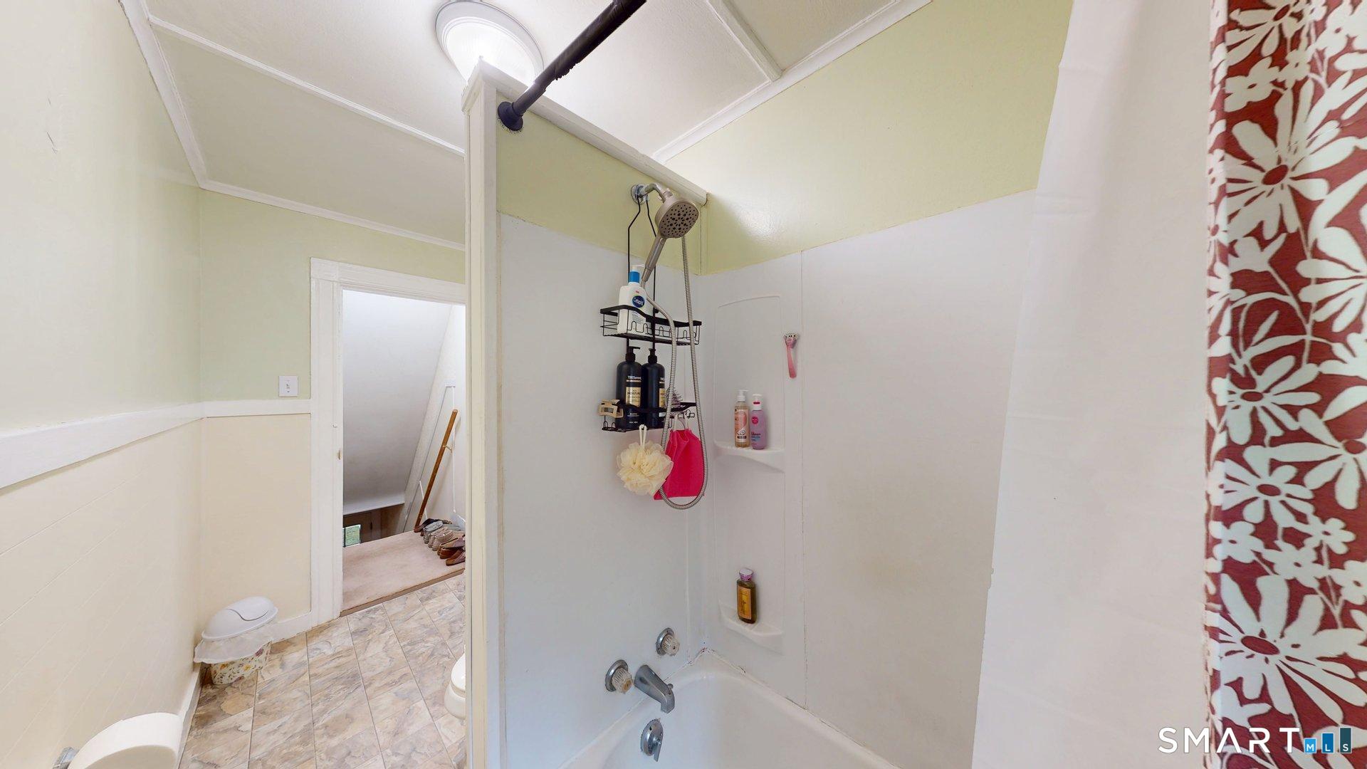 138 Main Street Somers, CT 06071 - Photo 22 of 38 a bathroom with a sink and a shower