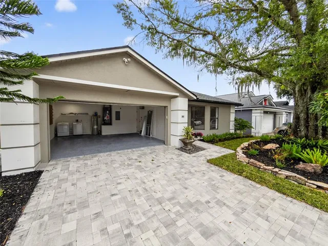 a view of an empty room and a window