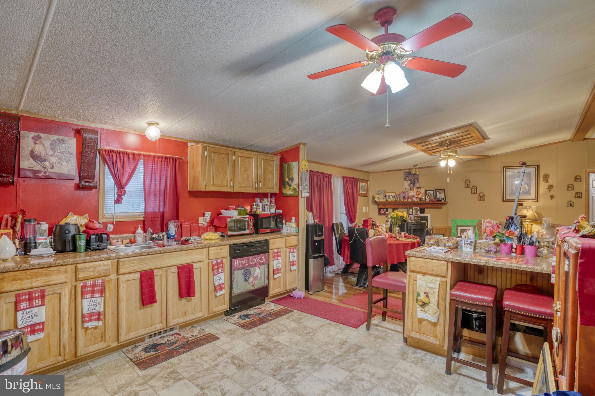 376 Graham Branch Road Seaford, DE 19973 - Photo 18 of 38 a kitchen that has a lot of cabinets