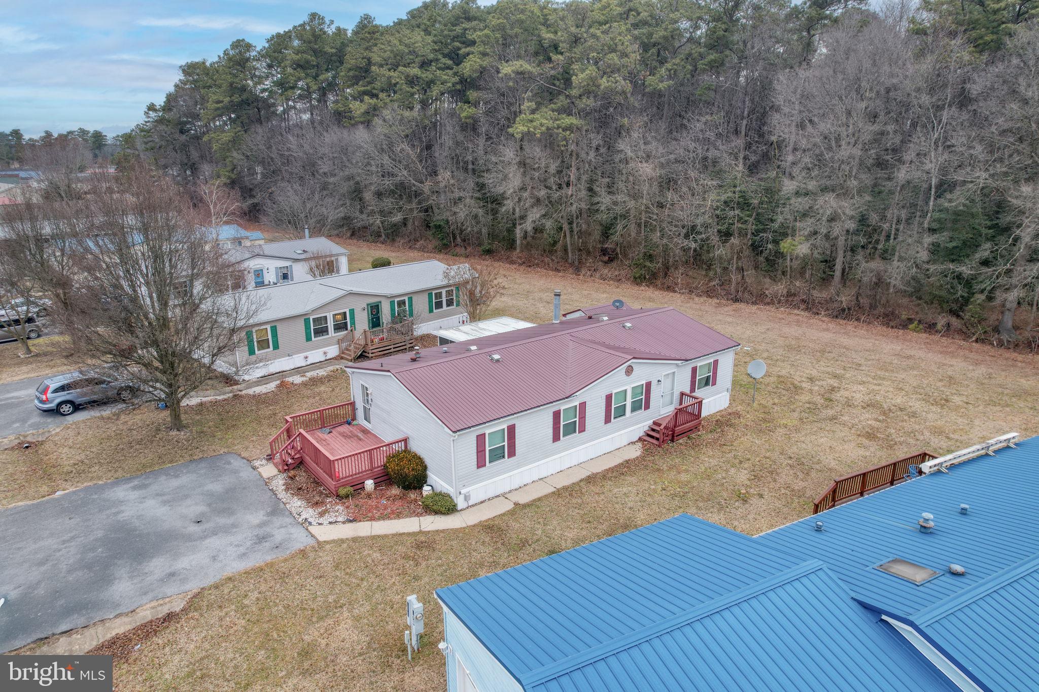 376 Graham Branch Road Seaford, DE 19973 - Photo 3 of 38 an aerial view of a house with roof deck