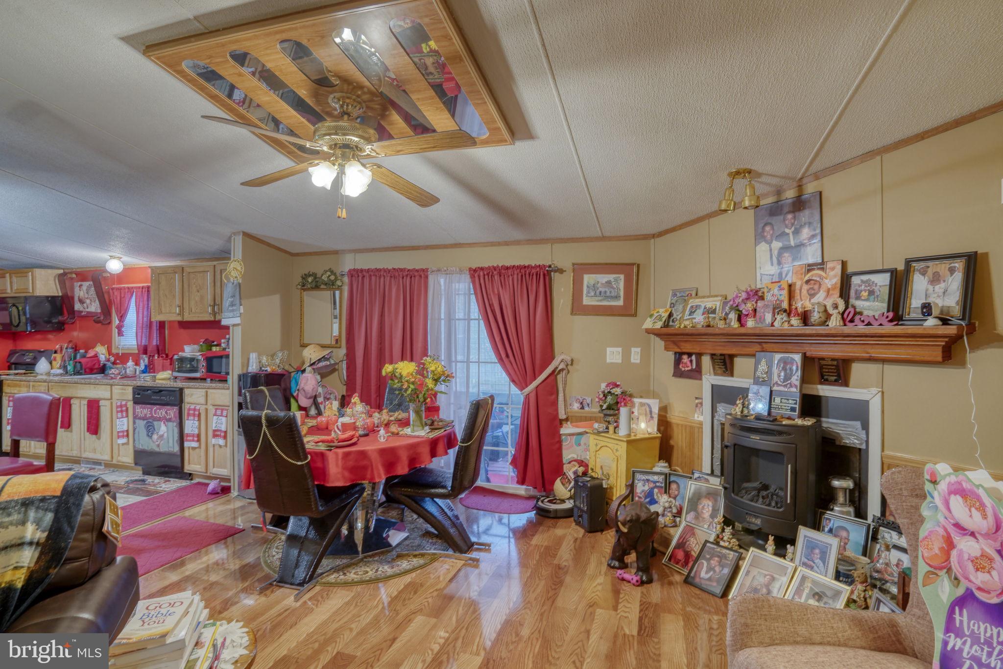 376 Graham Branch Road Seaford, DE 19973 - Photo 8 of 38 a view of a dining room with furniture and chandelier