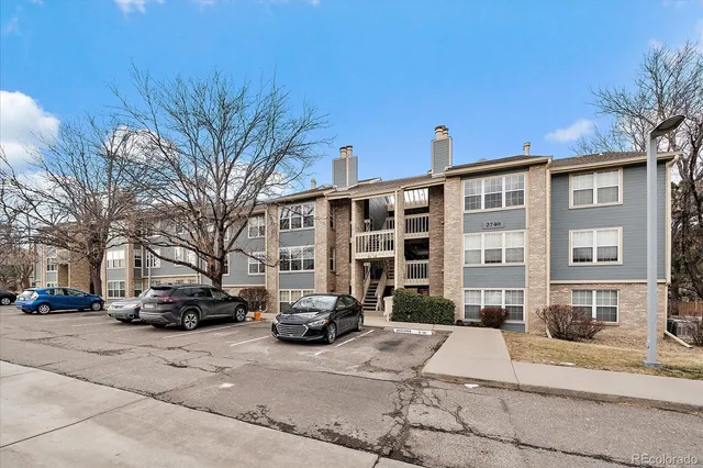 a building with trees in front of it