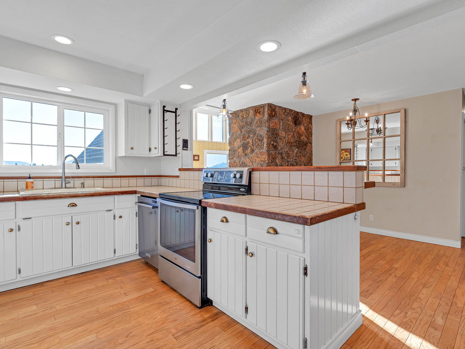 45833 Pittville Road McArthur, CA 96056 - Photo 23 of 81 a kitchen with granite countertop a sink and cabinets