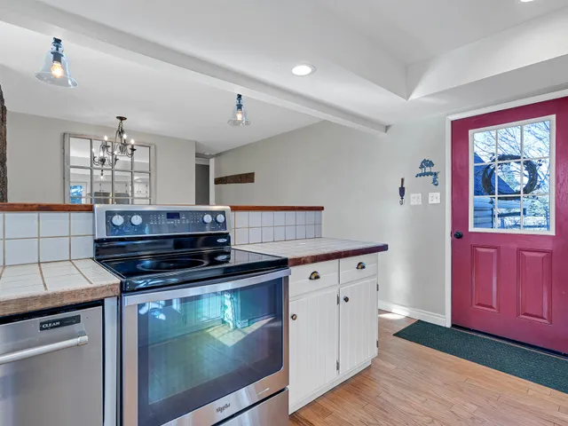 a view of a backyard of the house