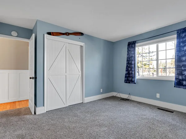 a view of cabinets and wooden floor