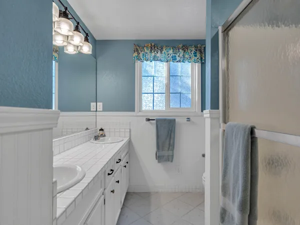 a view of a house with a yard porch and sitting area