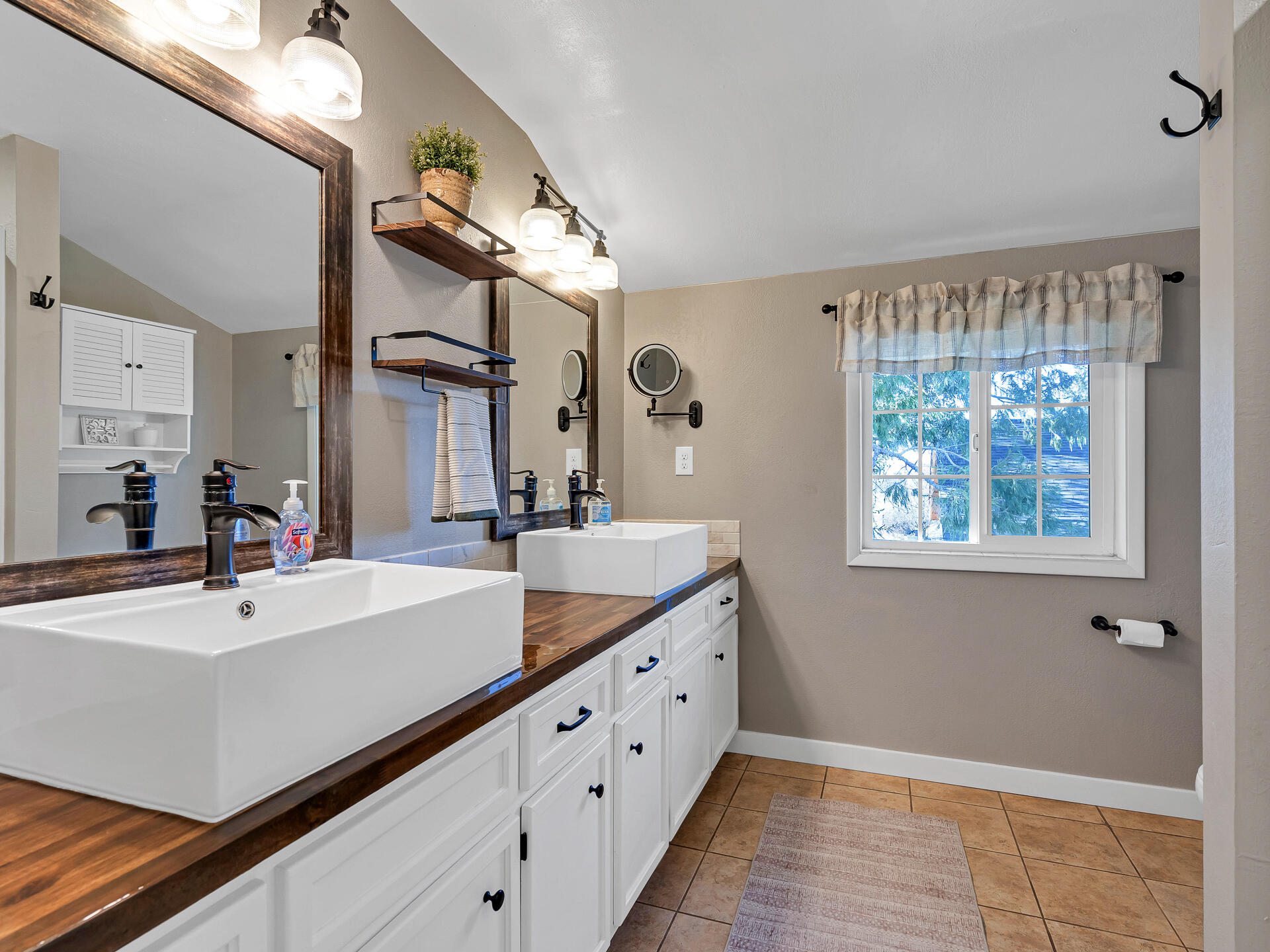 45833 Pittville Road McArthur, CA 96056 - Photo 42 of 81 a bathroom with a sink and a mirror
