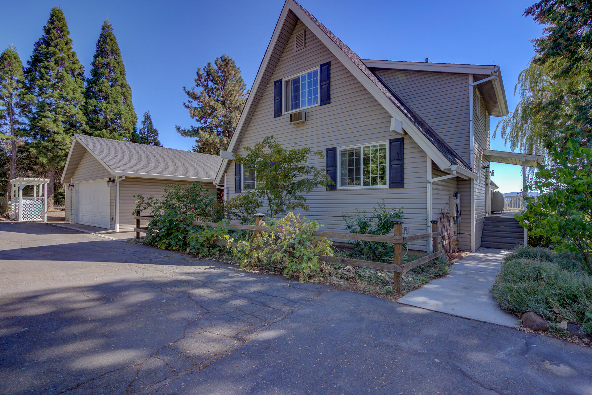 45833 Pittville Road McArthur, CA 96056 - Photo 5 of 81 a front view of a house with garden
