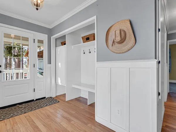 a view of a chairs and table on the deck