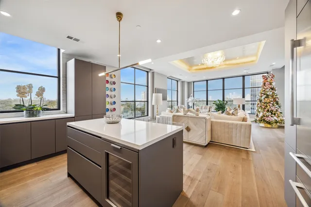 a kitchen with counter top space and stainless steel appliances