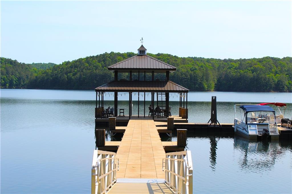 154 Council Oak Loop Waleska, GA 30183 - Photo 5 of 11 a front view of a house with lake view
