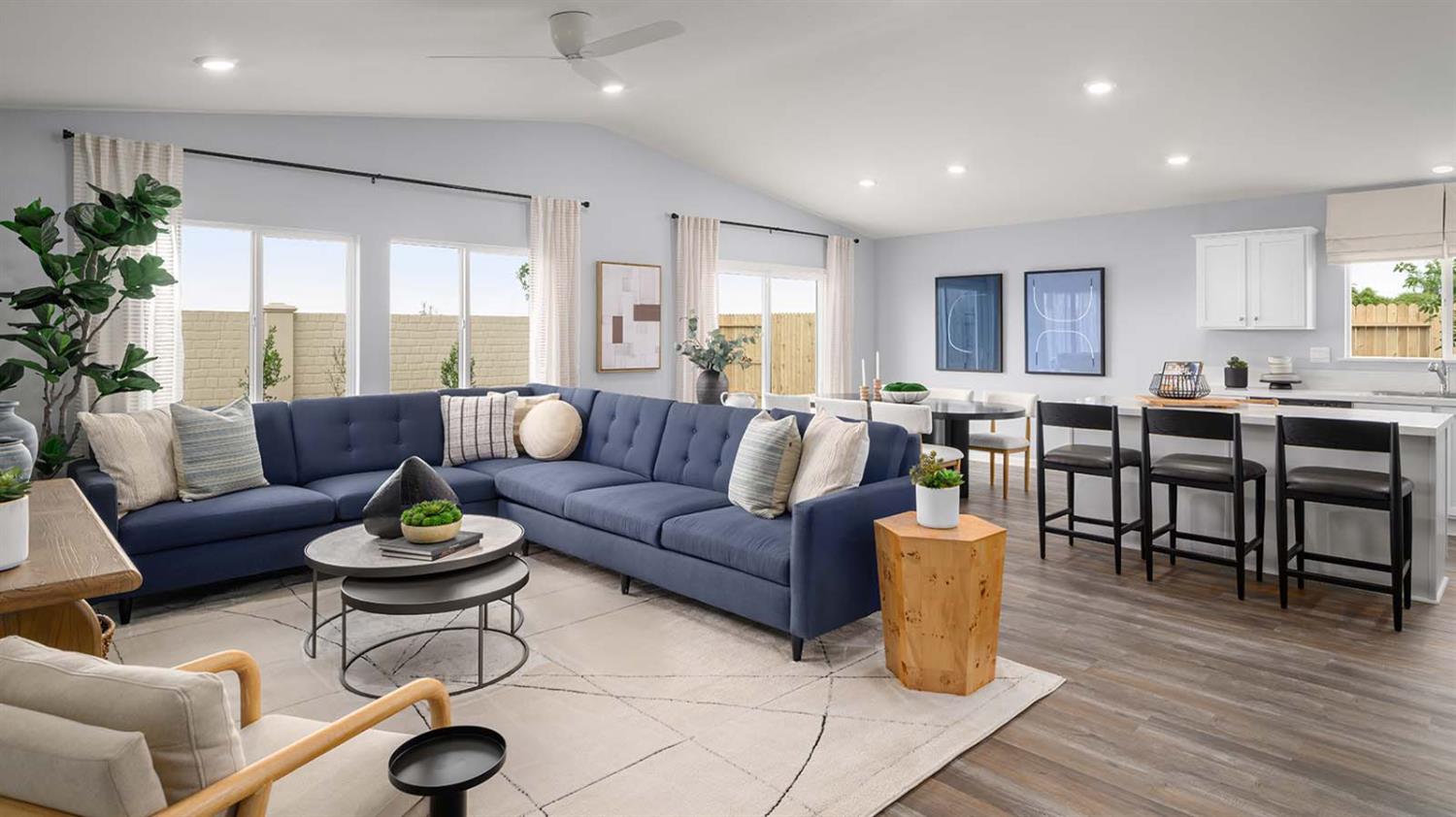 1657 Pacific Drive Los Banos, CA 93635 - Photo 3 of 10 a living room kitchen with furniture and wooden floor