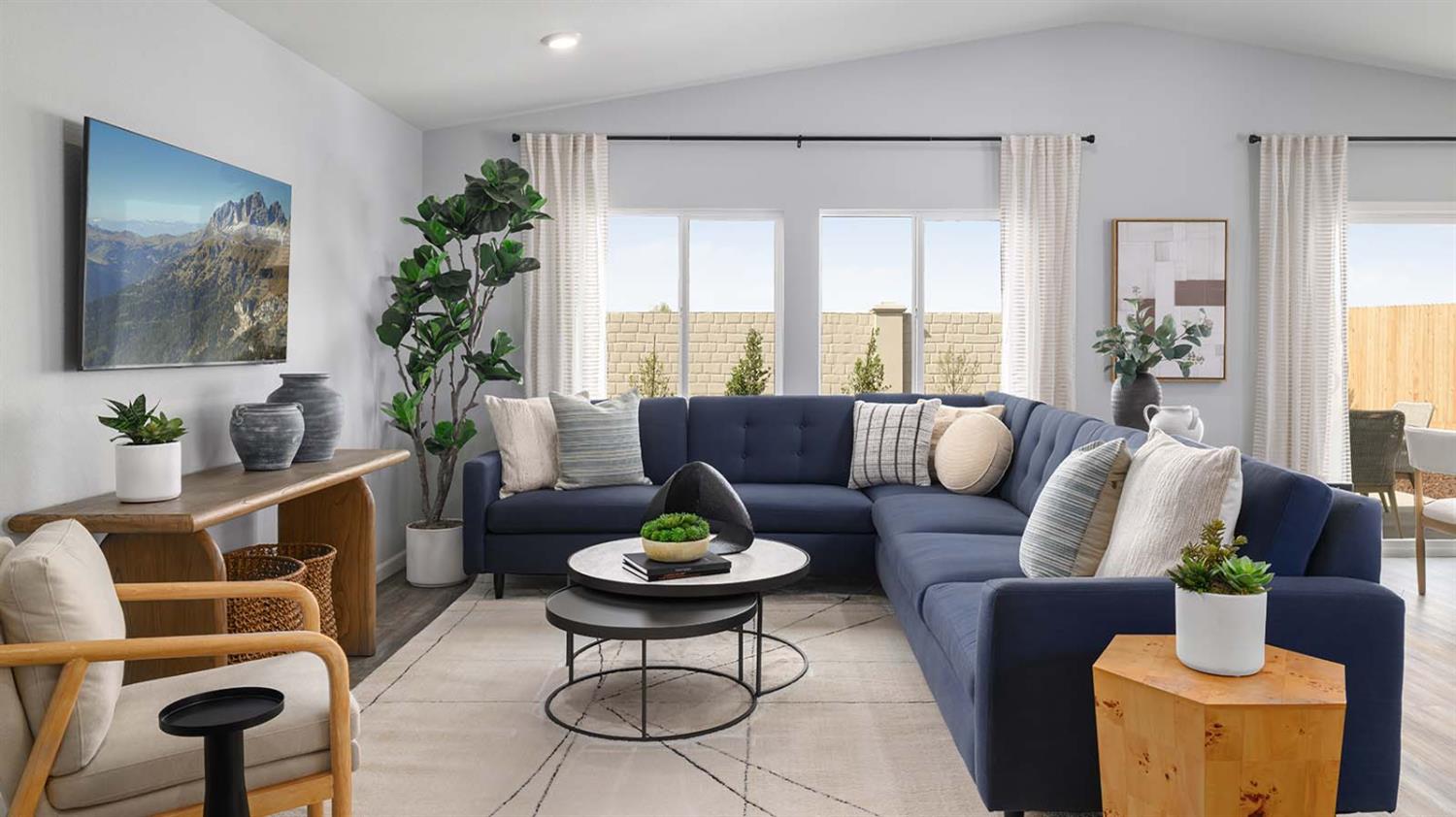 1657 Pacific Drive Los Banos, CA 93635 - Photo 4 of 10 a living room with furniture potted plant and a large window