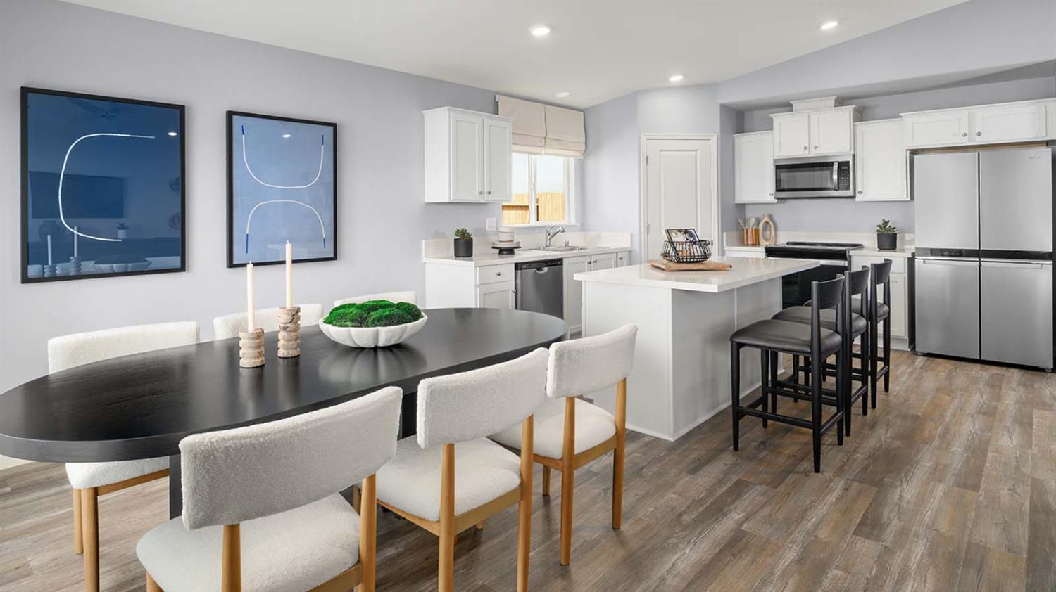 1657 Pacific Drive Los Banos, CA 93635 - Photo 6 of 10 a view of a dining room with furniture and wooden floor
