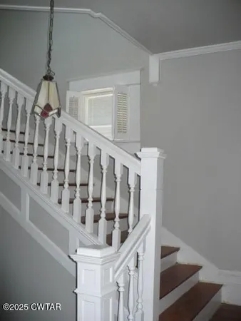 a view of entryway with staircase