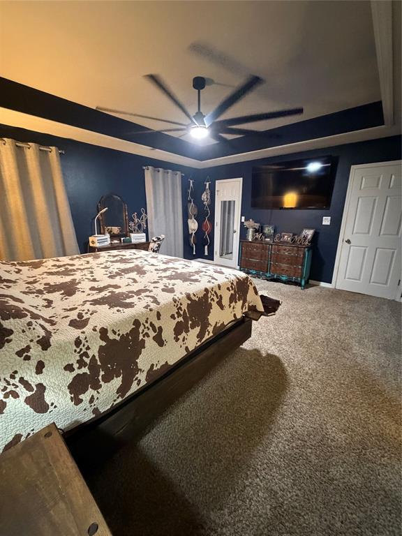 128 Staton Drive Haughton, LA 71037 - Photo 15 of 29 a bed sitting in a spacious bedroom next to a larger window