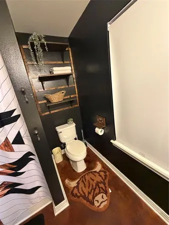 a bathroom with a sink vanity and a mirror