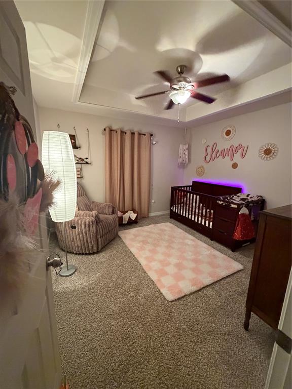 128 Staton Drive Haughton, LA 71037 - Photo 20 of 29 a bedroom with bed and a large window