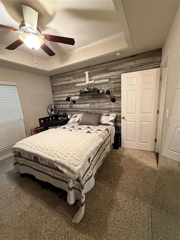 128 Staton Drive Haughton, LA 71037 - Photo 25 of 29 a bed sitting in a room next to a window