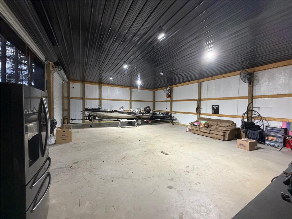 128 Staton Drive Haughton, LA 71037 - Photo 29 of 29 a view of a garage with storage