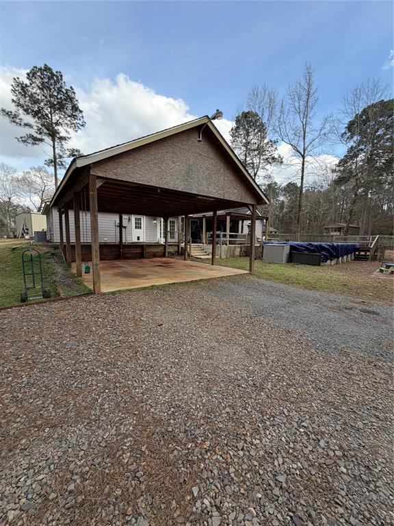 128 Staton Drive Haughton, LA 71037 - Photo 5 of 29 a front view of a house with a yard