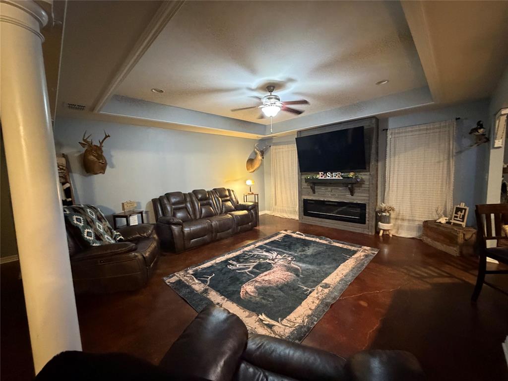 128 Staton Drive Haughton, LA 71037 - Photo 8 of 29 a living room with furniture and a flat screen tv