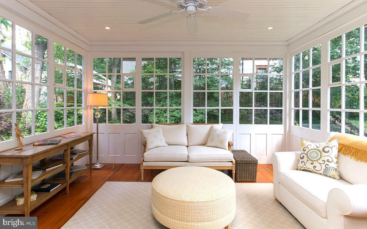 207 Club Road Baltimore, MD 21210 - Photo 10 of 24 Light-filled sunroom overlooking rear yard