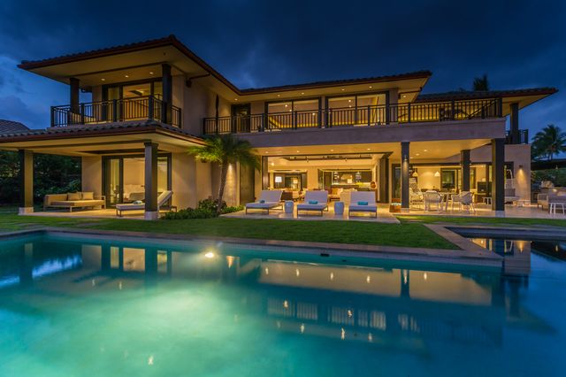 a front view of building with yard