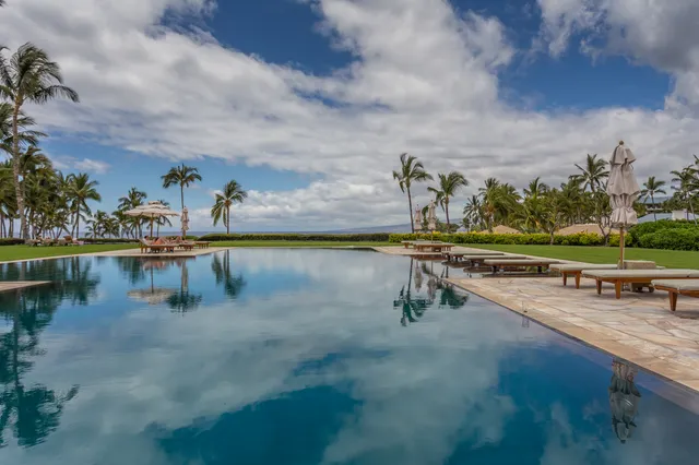 a view of a lake with a yard