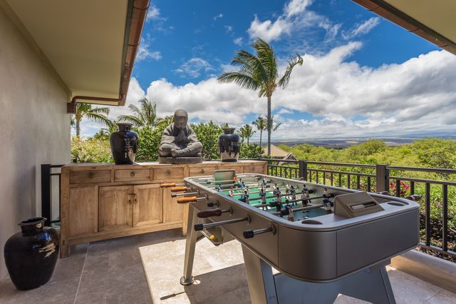 a view of swimming pool with furniture