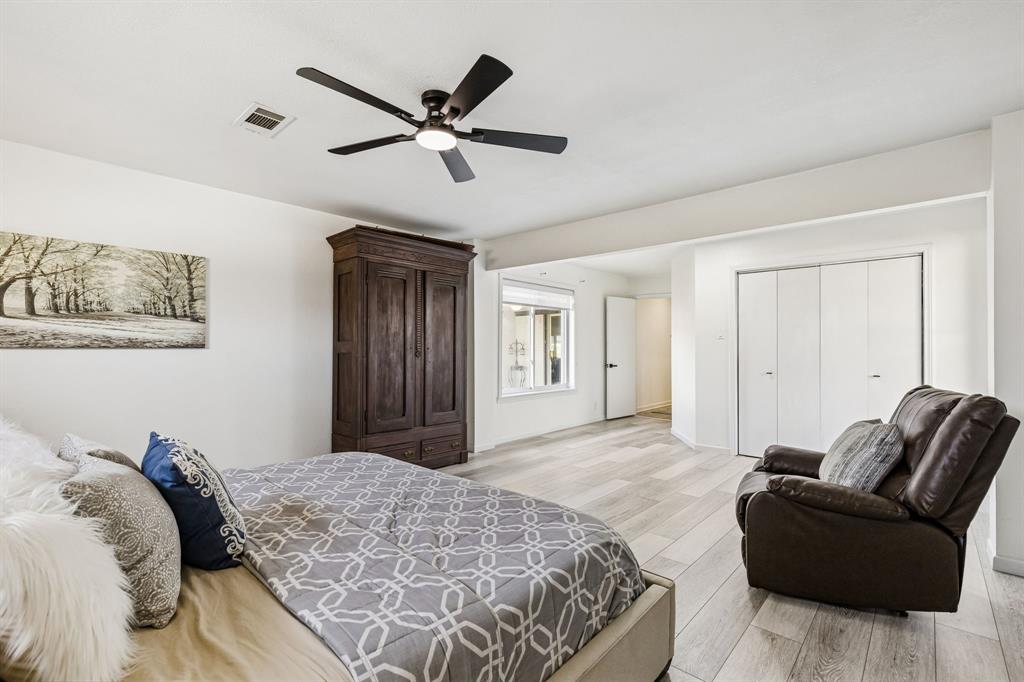 1012 Cowling Road Sanger, TX 76266 - Photo 22 of 40 a bedroom with a bed couches and window