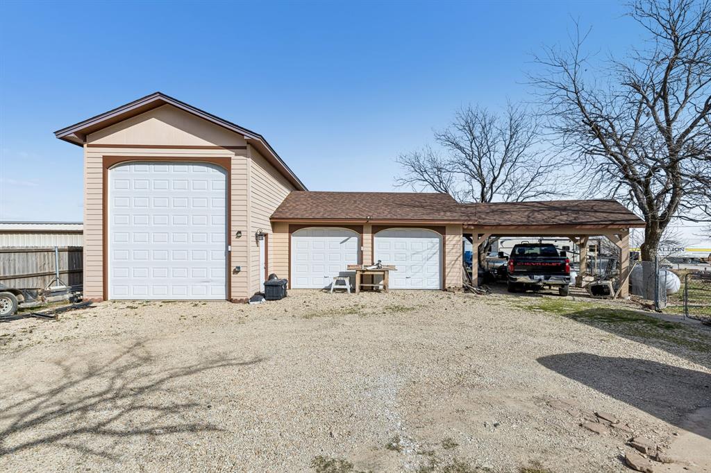 1012 Cowling Road Sanger, TX 76266 - Photo 24 of 40 a view of a house with a outdoor space and parking area