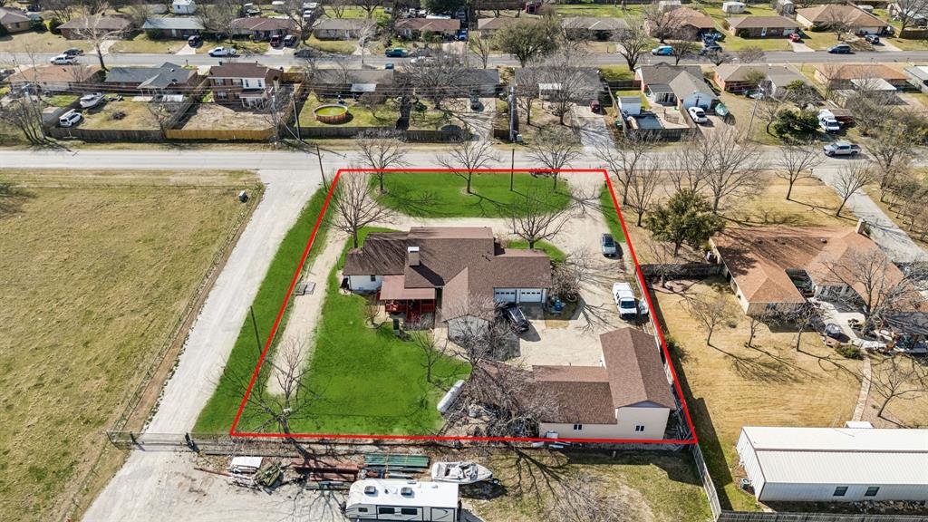 1012 Cowling Road Sanger, TX 76266 - Photo 33 of 40 an aerial view of residential houses with outdoor space