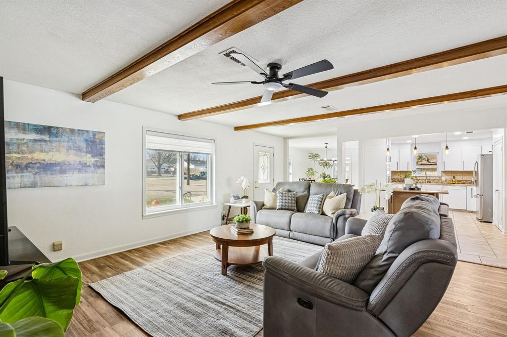 1012 Cowling Road Sanger, TX 76266 - Photo 5 of 40 a living room with furniture and a window