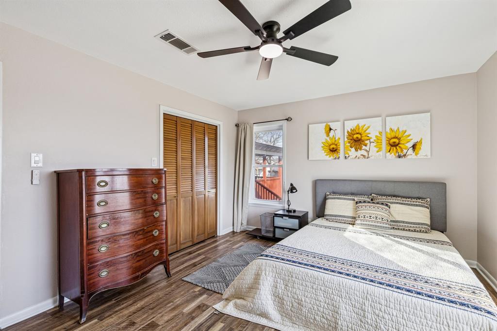 1012 Cowling Road Sanger, TX 76266 - Photo 9 of 40 a bedroom with a bed and wooden floor