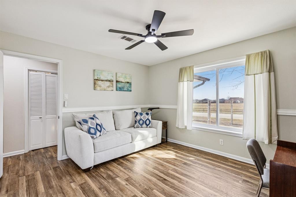1012 Cowling Road Sanger, TX 76266 - Photo 10 of 40 a living room with furniture and a window