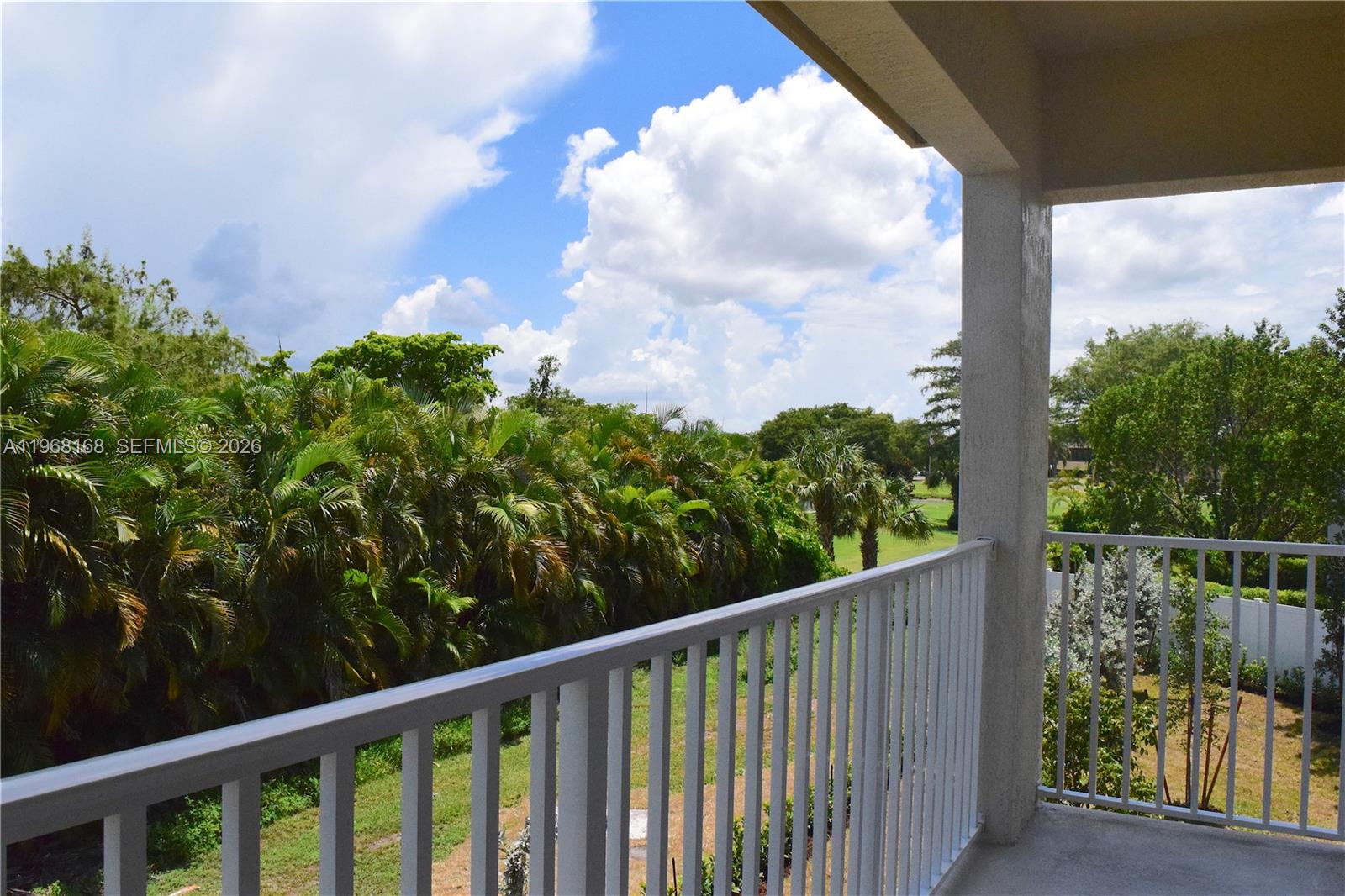 8440 West McNab Road, Unit 8440 Fort Lauderdale, FL 33321 - Photo 11 of 22 a view of a balcony with lake view