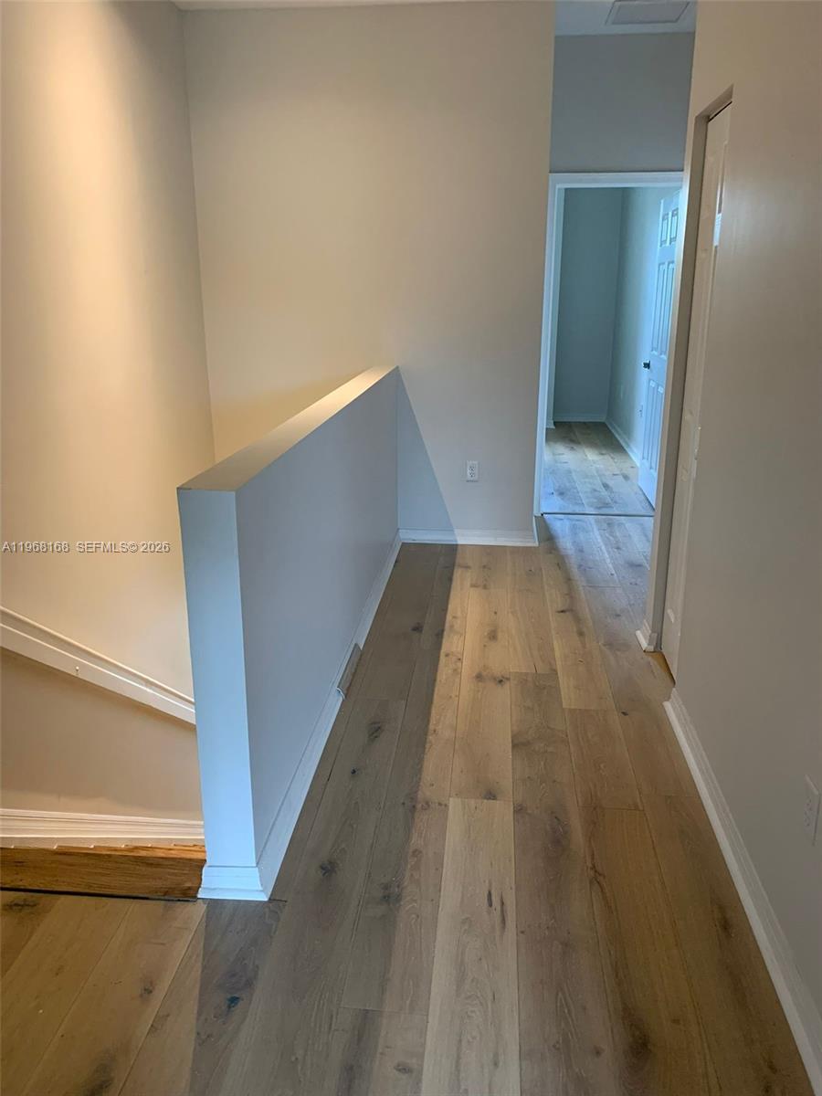 8440 West McNab Road, Unit 8440 Fort Lauderdale, FL 33321 - Photo 20 of 22 a view of wooden floor