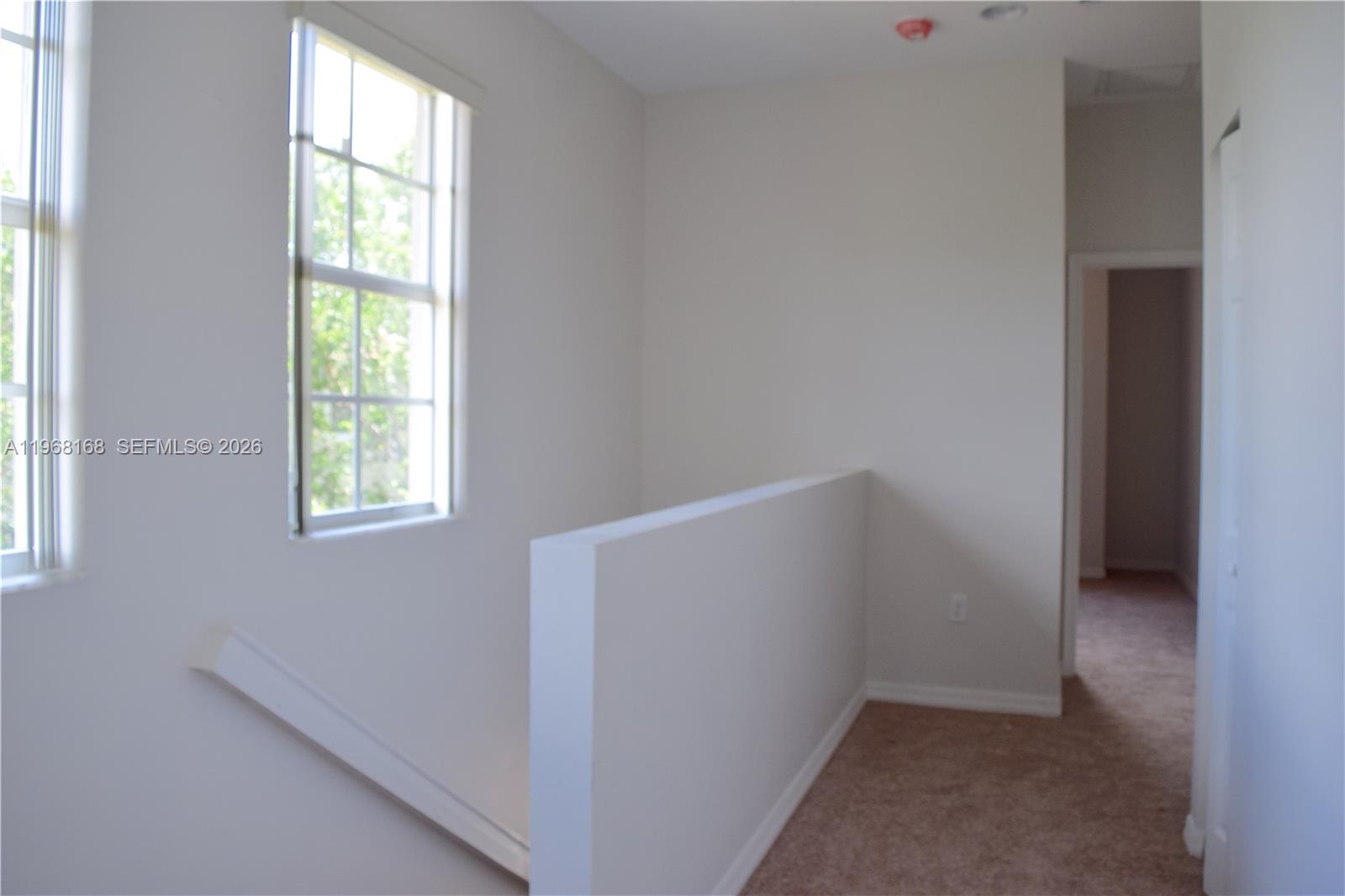 8440 West McNab Road, Unit 8440 Fort Lauderdale, FL 33321 - Photo 10 of 22 a view of an empty room with a window