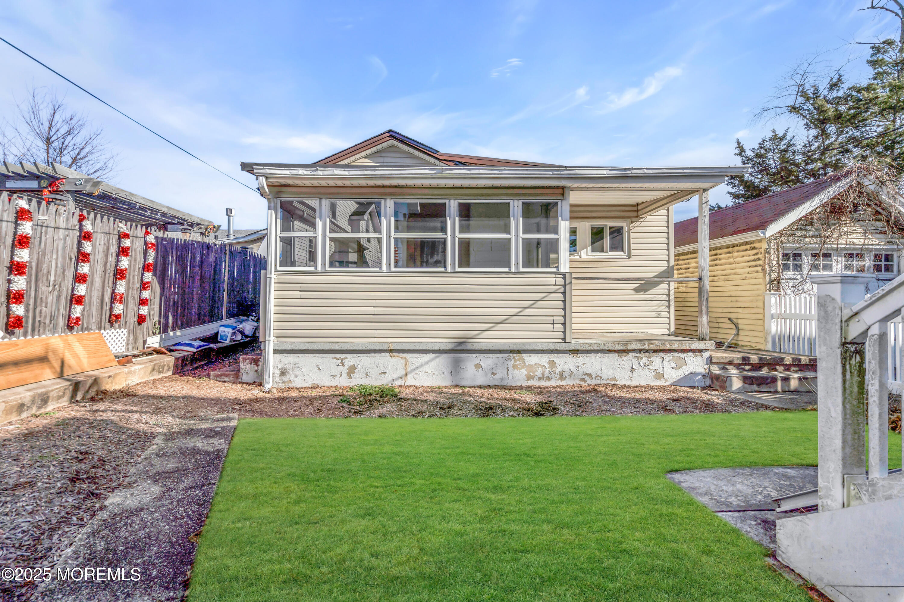 1812 Fernwood Road, Unit 2 Belmar, NJ 07719 - Photo 19 of 41 a front view of a house with a yard