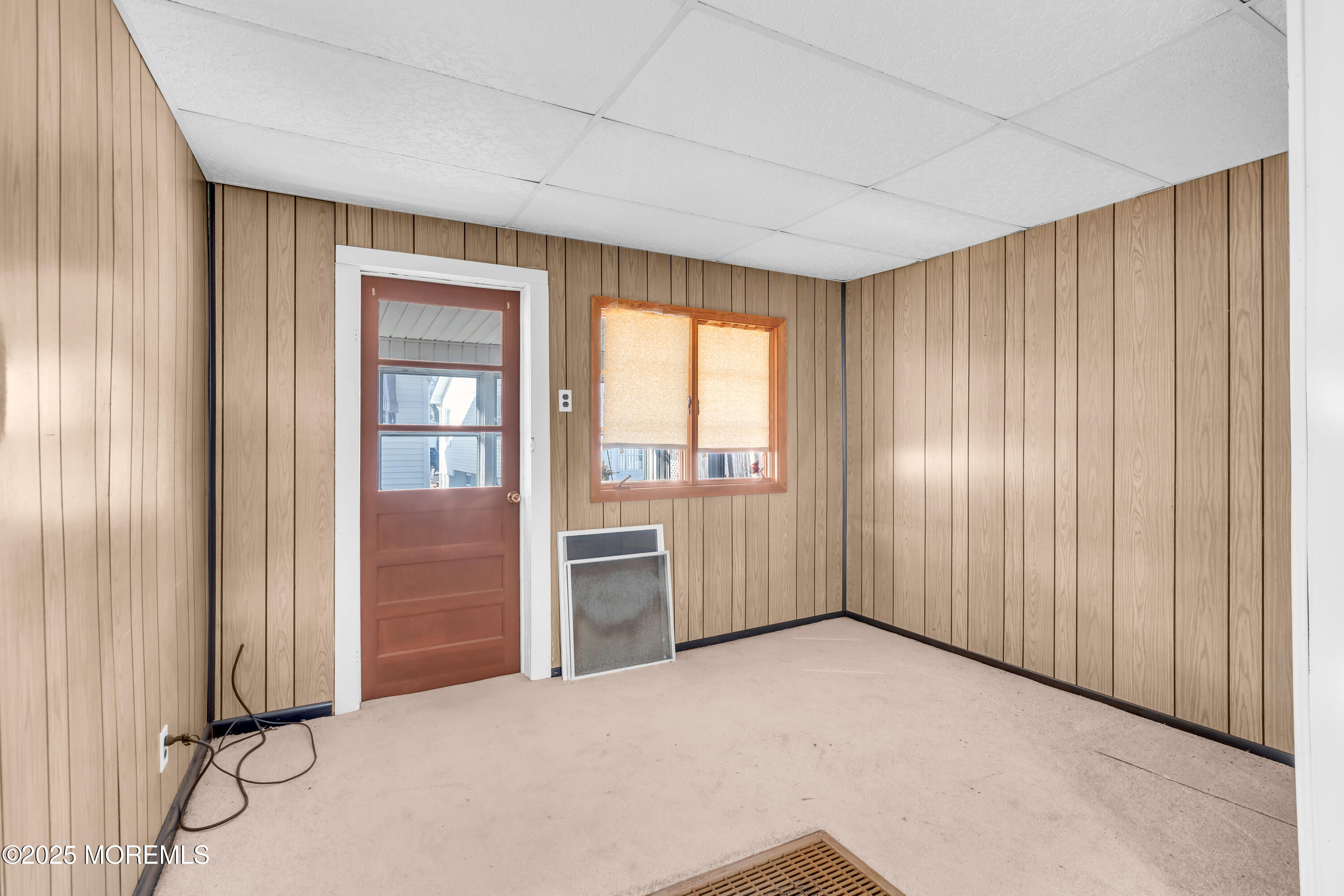 1812 Fernwood Road, Unit 2 Belmar, NJ 07719 - Photo 22 of 41 wooden floor and windows in an empty room